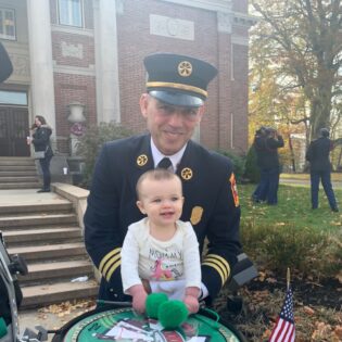 Joe Marchetti with his granddaughter