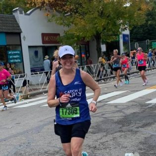 Kelly Benestad running the Boston Marathon 2021