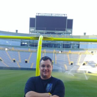 Alex Landazuri photograph on football field